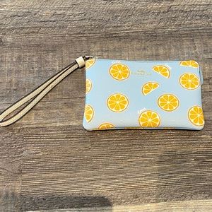 Brand new Coach wristlet